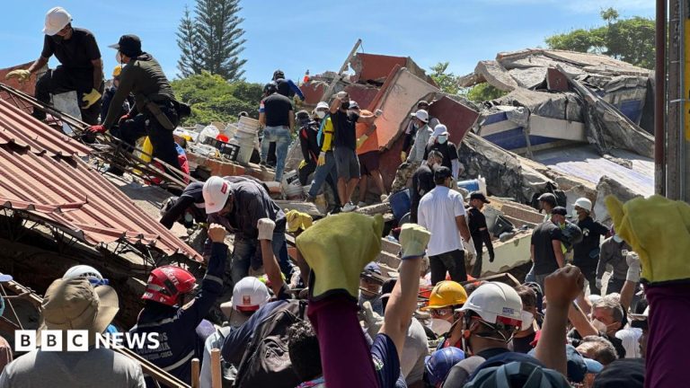 Anguish of Colombian brother at rubble of building being searched for earthquake survivors