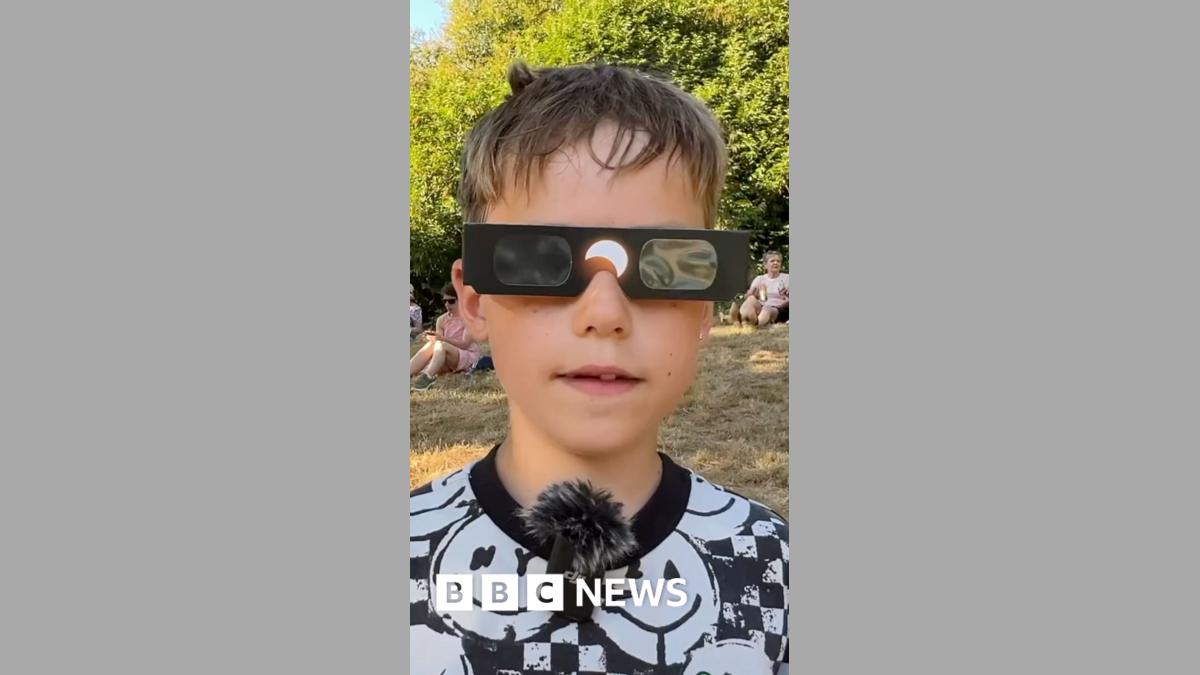 Boy, 8, enjoys historic solar eclipse