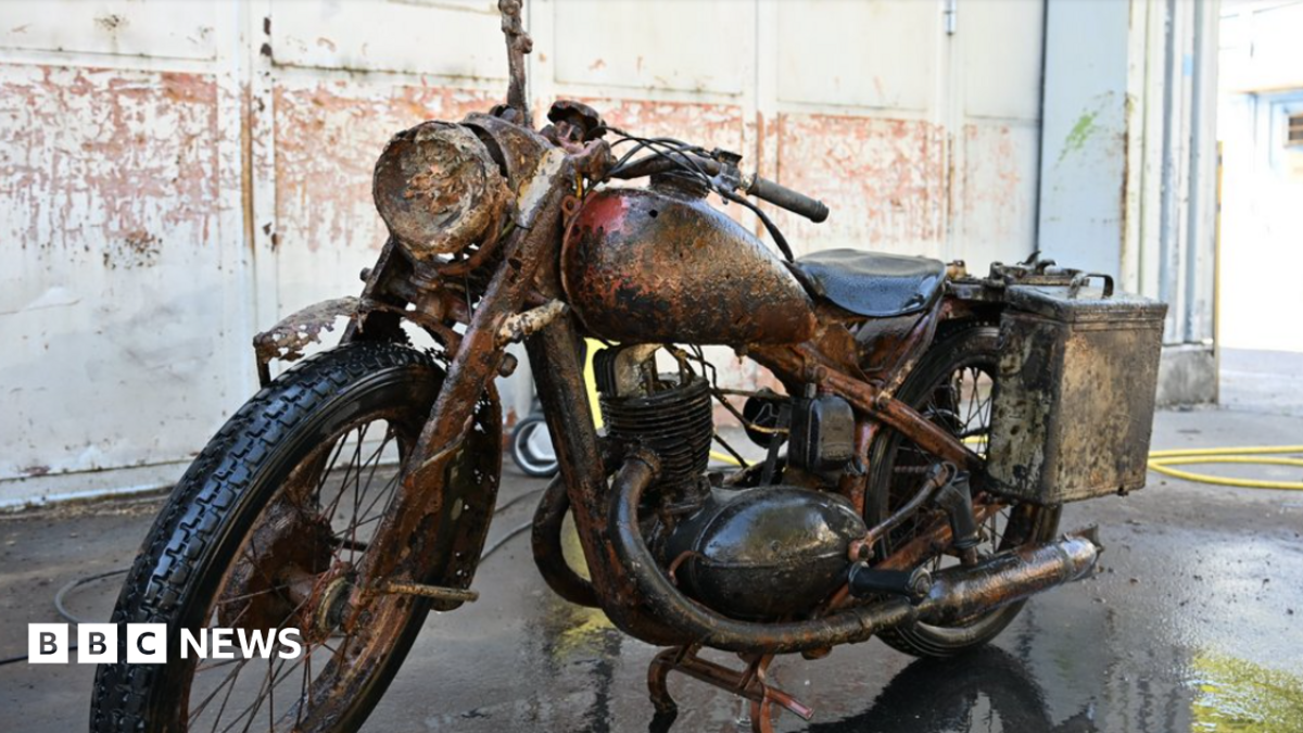 Danube river’s low water levels reveal remains of WWII soldiers and motorcycle