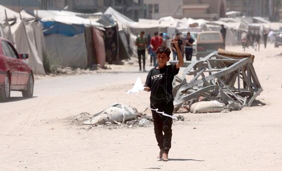 Four children killed as separate attacks in Gaza destroy aid supplies