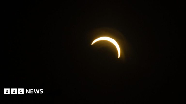 In pictures: Sky watchers gather for solar eclipse