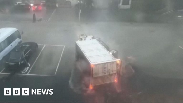 Lorry turns over as typhoon hits China