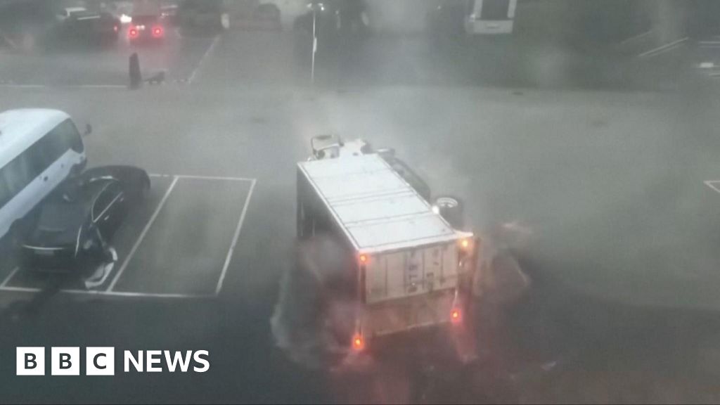 Lorry turns over as typhoon hits China