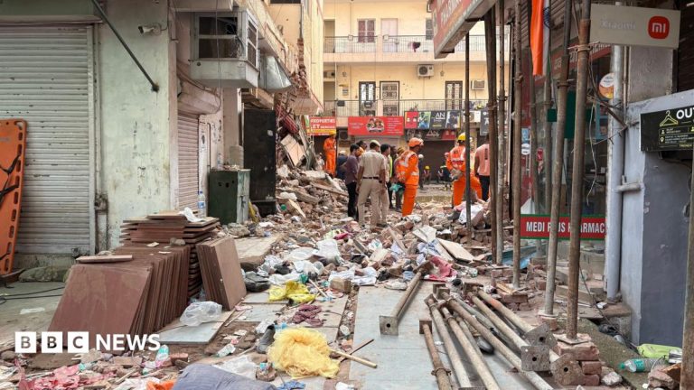 Rescuers dig through debris as seven dead in building collapse in Delhi