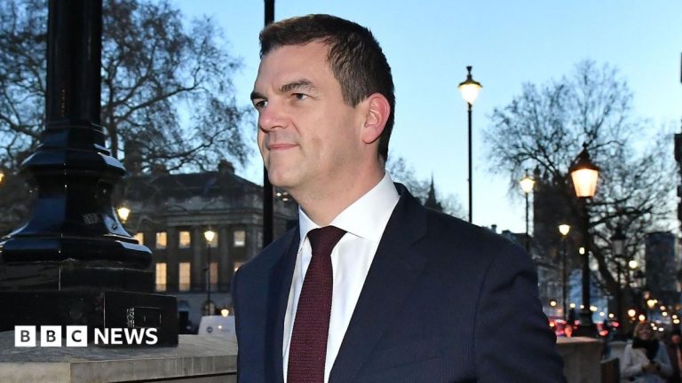 Ex-top official Robbins reaches settlement with government over sacking